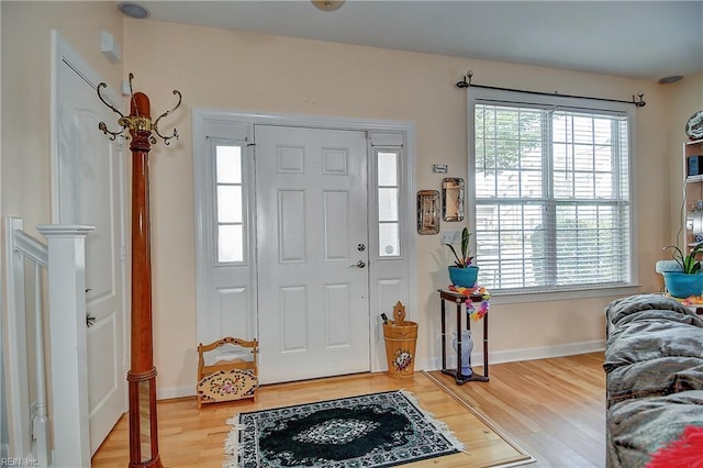 1132 Broadholme Pl Unit 642, Virginia Beach, VA 23455 - entrance foyer featuring healthy amount of natural light and wood finished floors