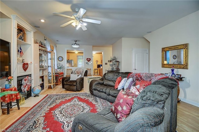 1132 Broadholme Pl Unit 642, Virginia Beach, VA 23455 - living area featuring wood finished floors and a ceiling fan