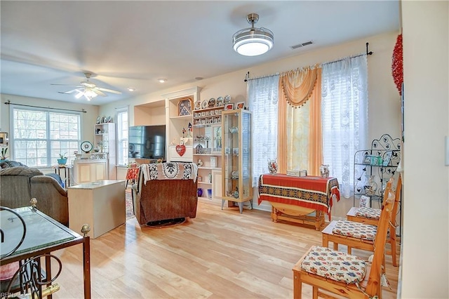 1132 Broadholme Pl Unit 642, Virginia Beach, VA 23455 - living area featuring ceiling fan and wood finished floors