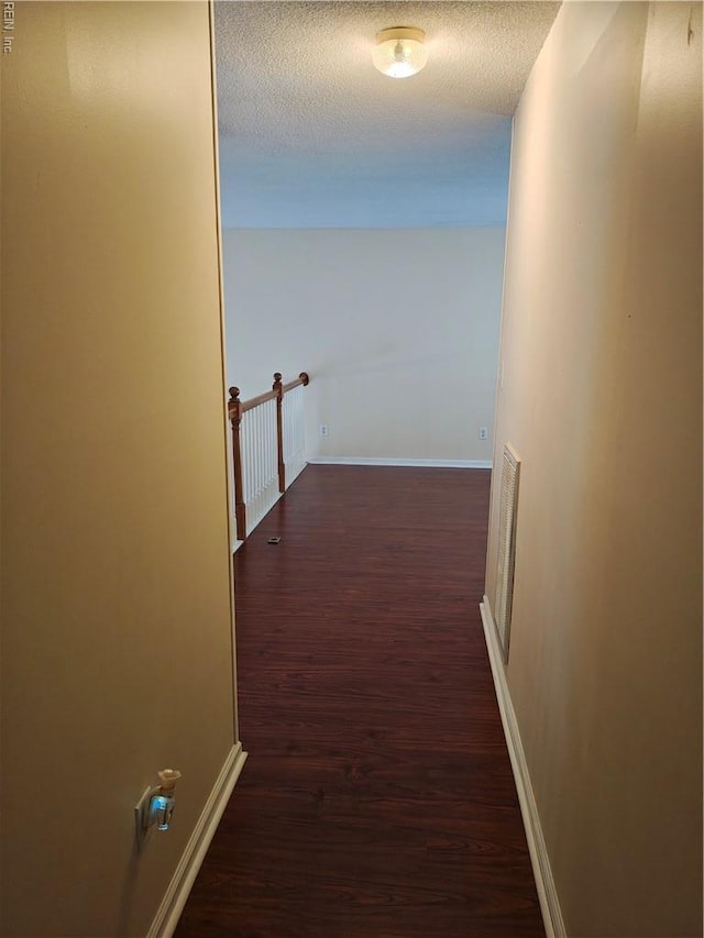 419 Adkins Arch Arch, Virginia Beach, VA 23462 - hallway featuring wood finished floors and a textured ceiling