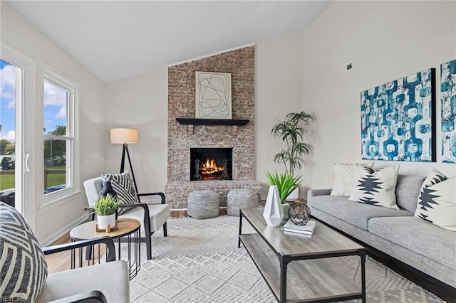1545 Lake James Dr, Virginia Beach, VA 23464 - living area with wood finished floors, a fireplace, and high vaulted ceiling