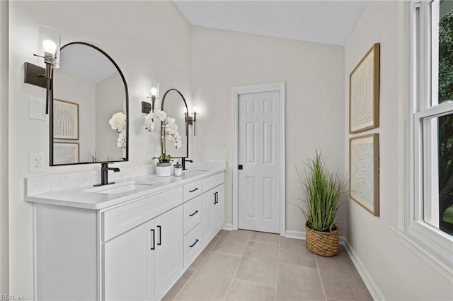 1545 Lake James Dr, Virginia Beach, VA 23464 - full bath featuring double vanity, vaulted ceiling, and tile patterned floors