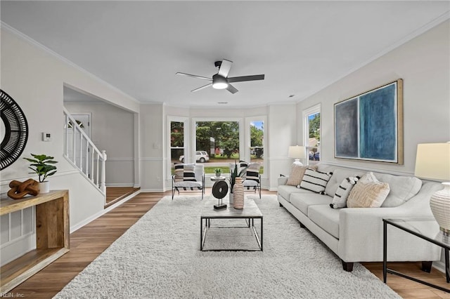 1545 Lake James Dr, Virginia Beach, VA 23464 - living room featuring ceiling fan, wood finished floors, ornamental molding, and stairs