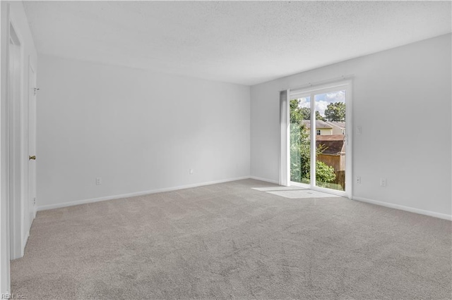 3555 Campion Ave, Virginia Beach, VA 23462 - carpeted spare room featuring baseboards and a textured ceiling