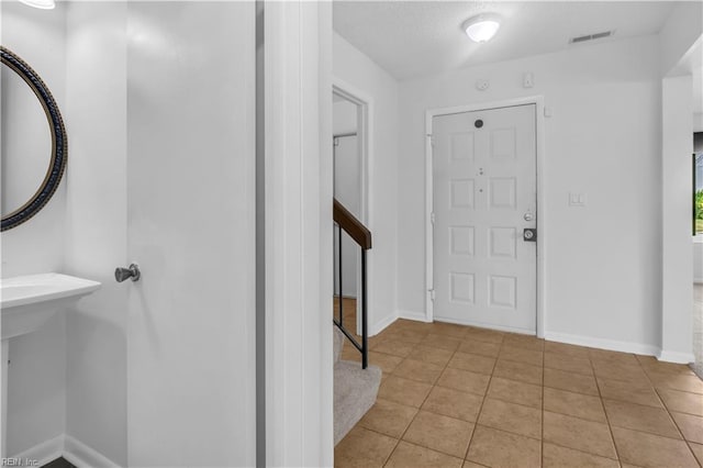 3555 Campion Ave, Virginia Beach, VA 23462 - foyer entrance with light tile patterned floors and baseboards