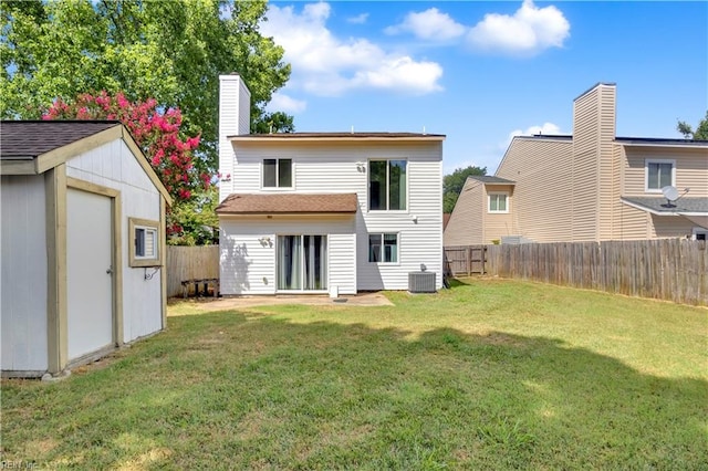 3555 Campion Ave, Virginia Beach, VA 23462 - rear view of property featuring a fenced backyard, a storage shed, and a chimney
