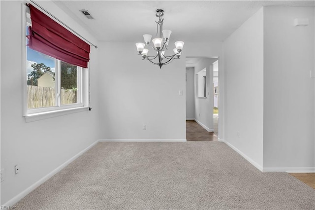 3555 Campion Ave, Virginia Beach, VA 23462 - carpeted empty room featuring a chandelier and baseboards