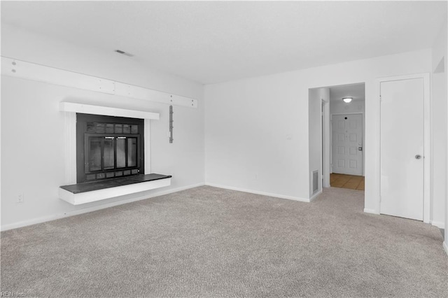 3555 Campion Ave, Virginia Beach, VA 23462 - unfurnished living room with a glass covered fireplace and carpet