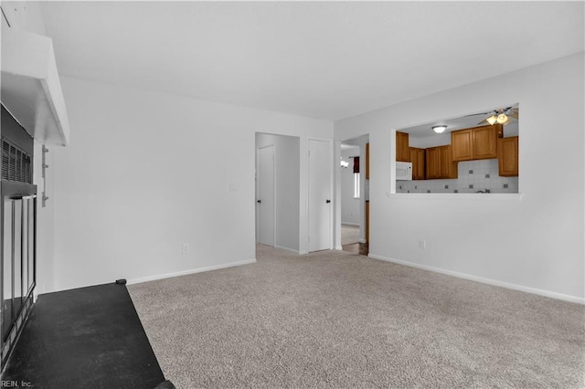 3555 Campion Ave, Virginia Beach, VA 23462 - unfurnished living room featuring light colored carpet and a ceiling fan