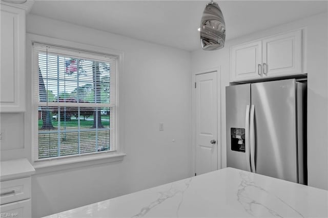 1917 Jack Frost Rd, Virginia Beach, VA 23455 - kitchen featuring stainless steel fridge, white cabinetry, and light stone countertops