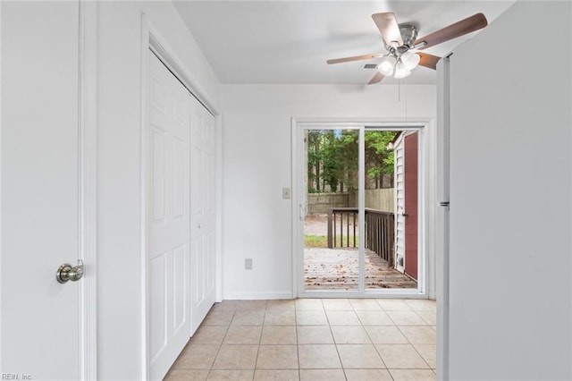 5433 Davis Way, Virginia Beach, VA 23462 - unfurnished bedroom featuring access to outside, light tile patterned floors, a closet, and a ceiling fan