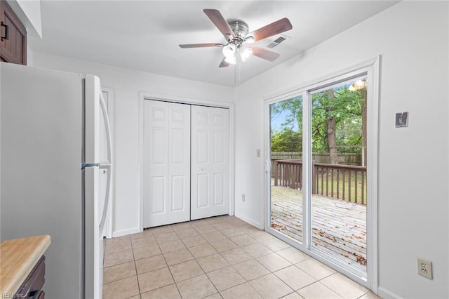 5433 Davis Way, Virginia Beach, VA 23462 - unfurnished dining area with a ceiling fan and light tile patterned floors
