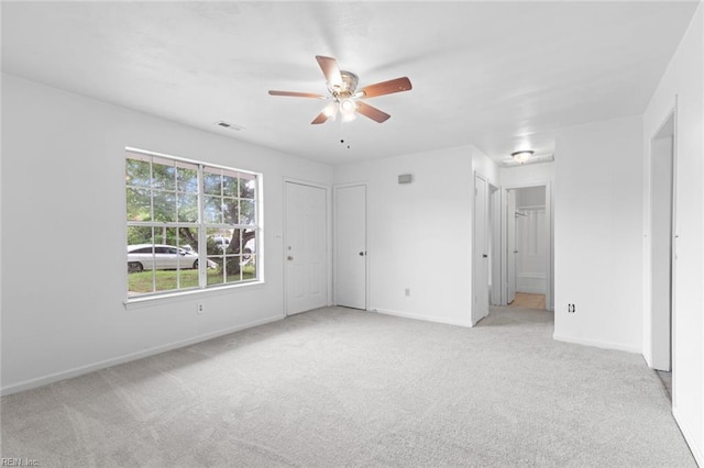 5433 Davis Way, Virginia Beach, VA 23462 - unfurnished bedroom featuring carpet flooring, ceiling fan, and multiple closets