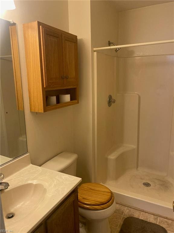 1623 Mantane Arch Arch, Virginia Beach, VA 23454 - bathroom featuring a stall shower, vanity, and tile patterned flooring