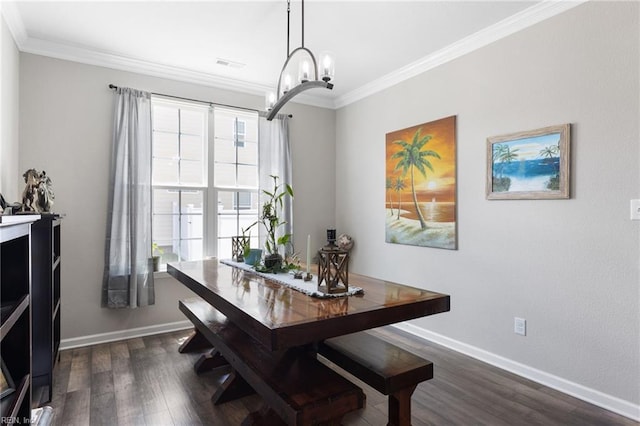 4202 Ravine Gap Dr, Suffolk, VA 23434 - dining space featuring dark wood-type flooring, crown molding, and a chandelier