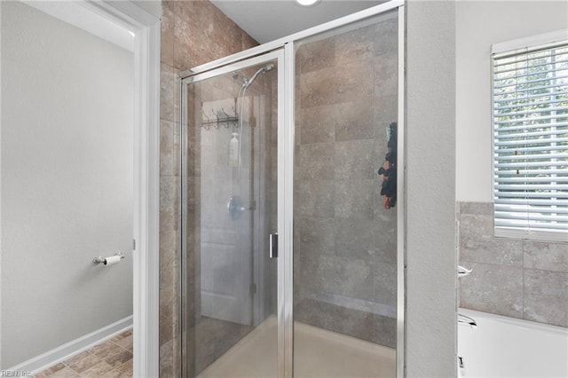 4202 Ravine Gap Dr, Suffolk, VA 23434 - bathroom featuring plenty of natural light and a stall shower