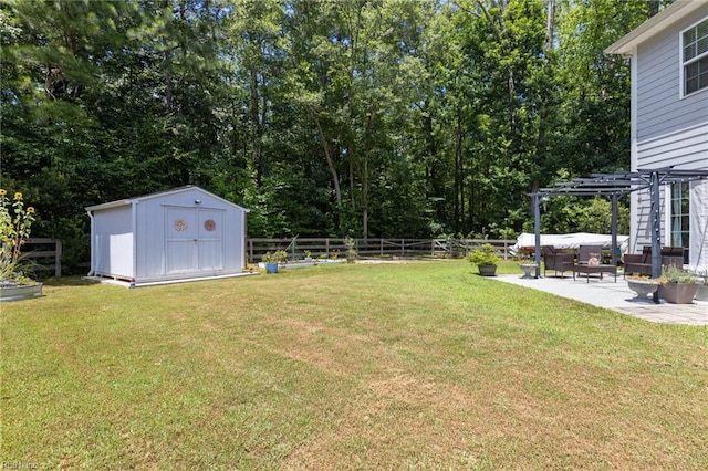 4202 Ravine Gap Dr, Suffolk, VA 23434 - fenced backyard with a patio, a pergola, and a storage unit
