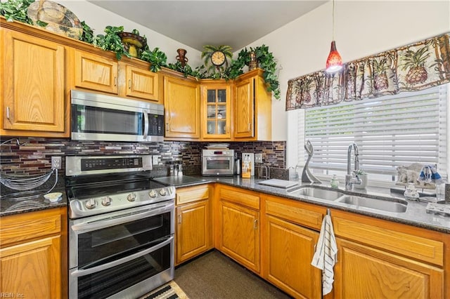 1513 Pebblebrook Way, Virginia Beach, VA 23464 - kitchen with stainless steel appliances, tasteful backsplash, and brown cabinets