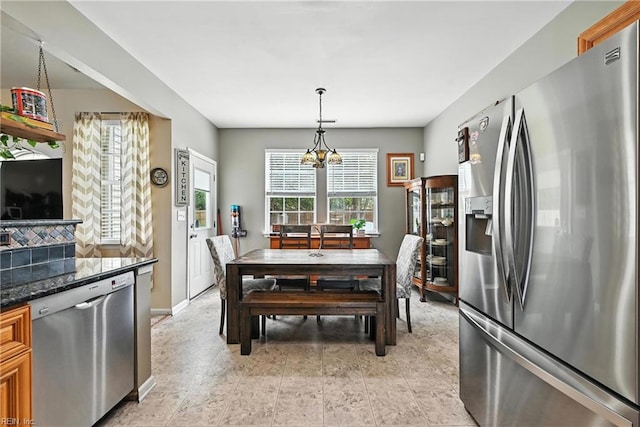 315 Sawmill Arch, Chesapeake, VA 23323 - dining space featuring a chandelier and baseboards