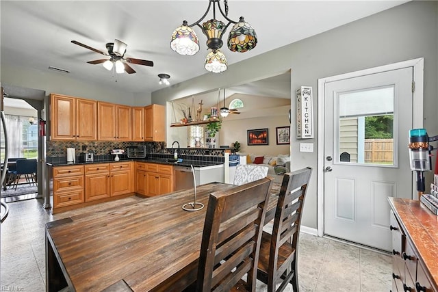 315 Sawmill Arch, Chesapeake, VA 23323 - kitchen with healthy amount of natural light, backsplash, dark countertops, and a ceiling fan