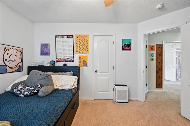315 Sawmill Arch, Chesapeake, VA 23323 - bedroom with light colored carpet, a ceiling fan, and a textured ceiling