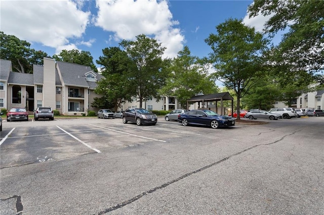313 River Forest Rd, Virginia Beach, VA 23454 - uncovered parking lot featuring a residential view