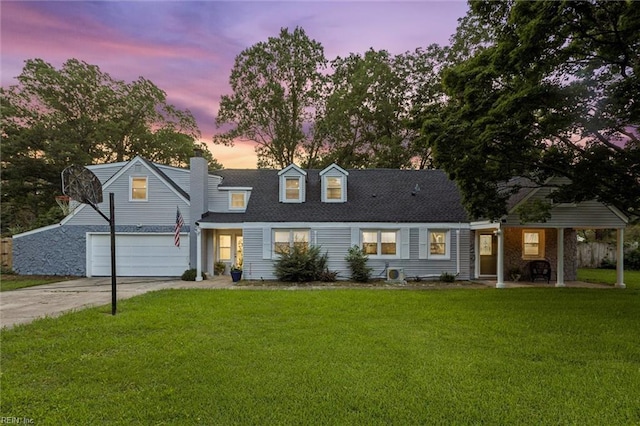 5016 Madeira Rd, Virginia Beach, VA 23455 - view of front of home featuring concrete driveway, a front yard, an attached garage, and a chimney