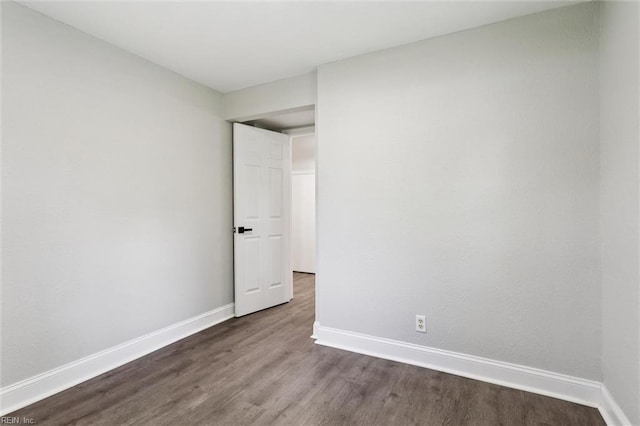 5016 Madeira Rd, Virginia Beach, VA 23455 - unfurnished bedroom featuring dark wood-style floors and baseboards