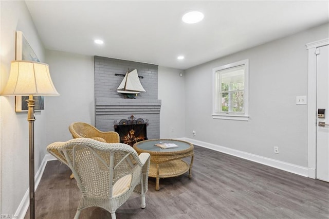 5016 Madeira Rd, Virginia Beach, VA 23455 - living area featuring a brick fireplace, wood finished floors, and recessed lighting