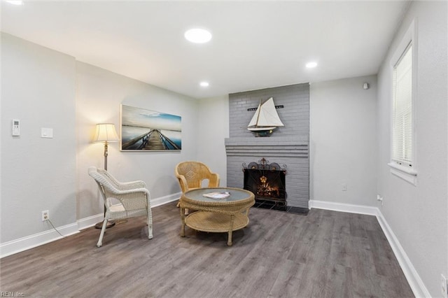 5016 Madeira Rd, Virginia Beach, VA 23455 - living area with wood finished floors, a brick fireplace, and recessed lighting