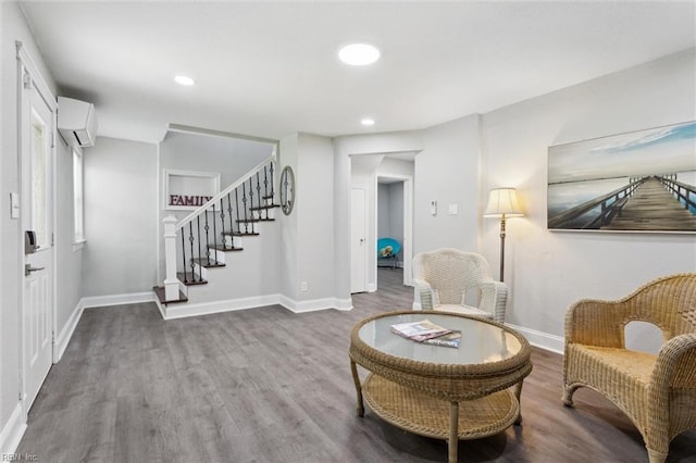 5016 Madeira Rd, Virginia Beach, VA 23455 - sitting room featuring a wall mounted air conditioner, wood finished floors, stairs, and recessed lighting