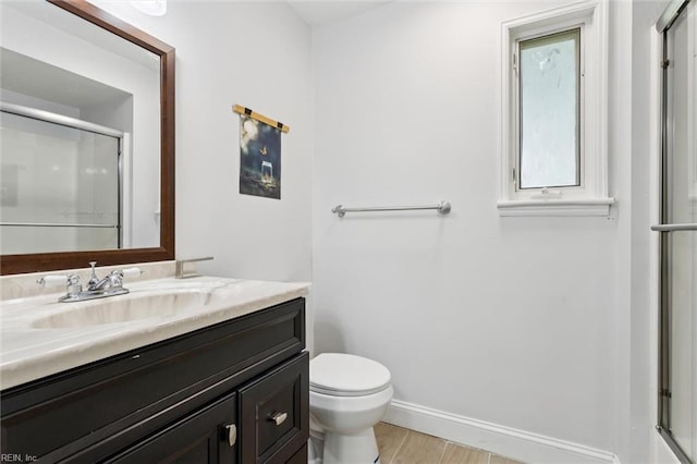 5016 Madeira Rd, Virginia Beach, VA 23455 - full bath featuring a shower with door, vanity, and wood finished floors