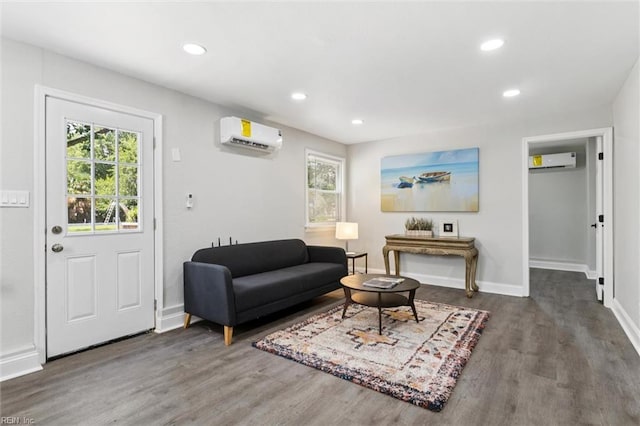 5016 Madeira Rd, Virginia Beach, VA 23455 - living area with a wall mounted AC, wood finished floors, healthy amount of natural light, and recessed lighting
