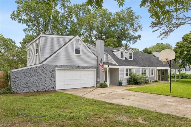 5016 Madeira Rd, Virginia Beach, VA 23455 - view of front of house with concrete driveway, a chimney, a front lawn, and an attached garage