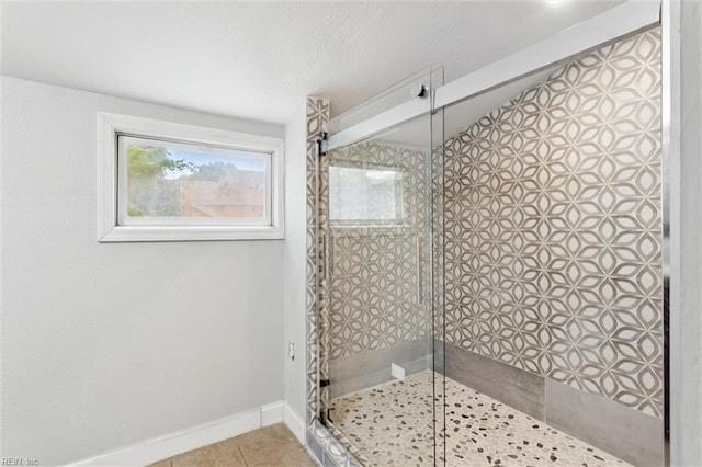 5016 Madeira Rd, Virginia Beach, VA 23455 - bathroom featuring tiled shower, plenty of natural light, tile patterned floors, and lofted ceiling