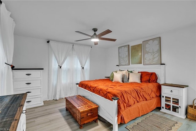 4057 Woodland Dr, Chesapeake, VA 23321 - bedroom with light wood-style flooring and a ceiling fan