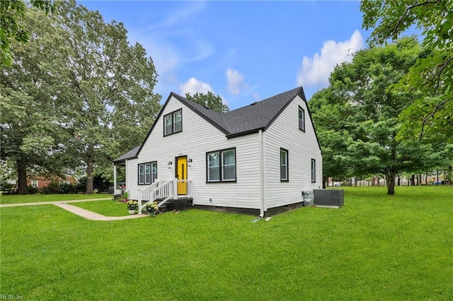 4057 Woodland Dr, Chesapeake, VA 23321 - view of front of property with crawl space, a front lawn, and a shingled roof
