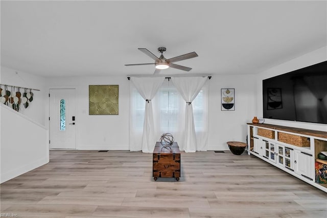 4057 Woodland Dr, Chesapeake, VA 23321 - living area with ceiling fan, healthy amount of natural light, and light wood-type flooring