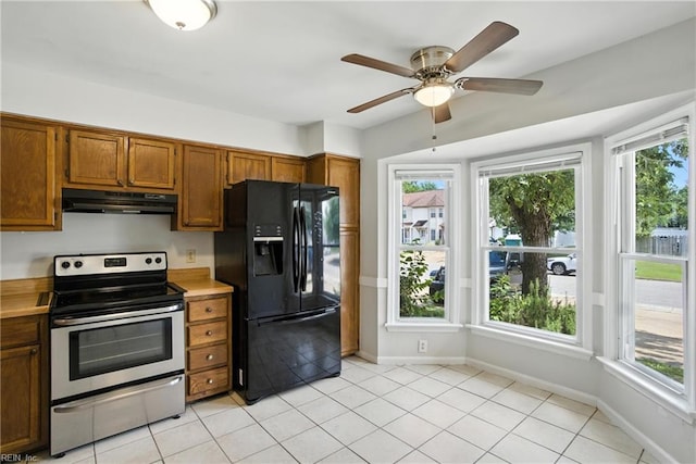 4636 Marlwood Way, Virginia Beach, VA 23462 - kitchen with black fridge, stainless steel electric range, under cabinet range hood, brown cabinetry, and light countertops
