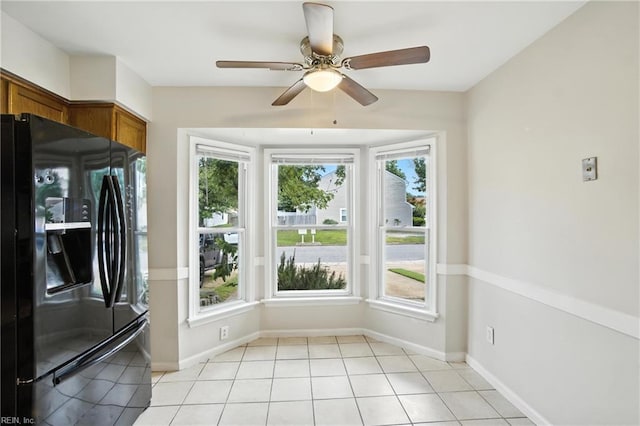 4636 Marlwood Way, Virginia Beach, VA 23462 - kitchen featuring black refrigerator with ice dispenser, brown cabinetry, ceiling fan, and light tile patterned floors