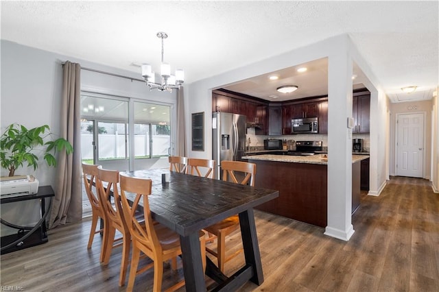 904 Gossman Dr, Virginia Beach, VA 23452 - dining room featuring a chandelier, dark wood-style flooring, and recessed lighting