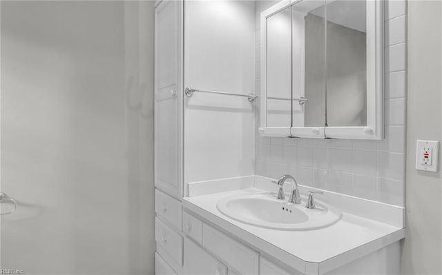 5991 Clear Springs Rd, Virginia Beach, VA 23464 - bathroom featuring decorative backsplash and vanity