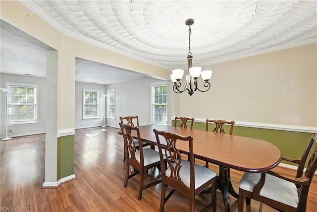 4300 Galston Ct, Chesapeake, VA 23321 - dining area with wood finished floors, a chandelier, and ornamental molding