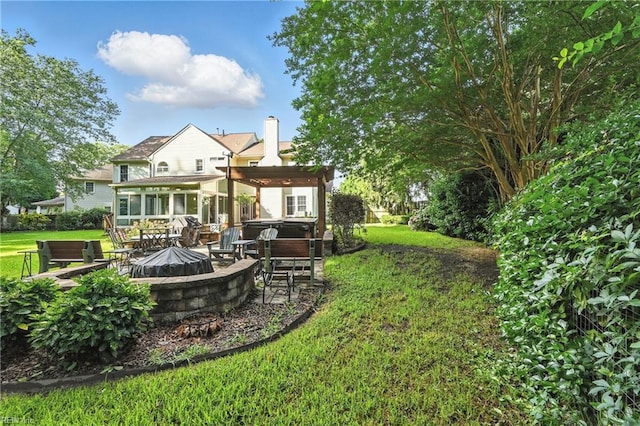 4300 Galston Ct, Chesapeake, VA 23321 - rear view of house with a pergola, a fire pit, a lawn, a patio, and a chimney