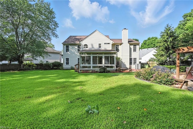 4300 Galston Ct, Chesapeake, VA 23321 - rear view of house featuring a sunroom, a chimney, and a shingled roof