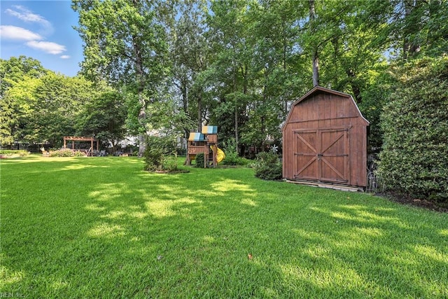 4300 Galston Ct, Chesapeake, VA 23321 - view of green lawn featuring a playground and a shed