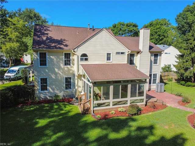 4300 Galston Ct, Chesapeake, VA 23321 - back of property with a sunroom, a chimney, and a shingled roof