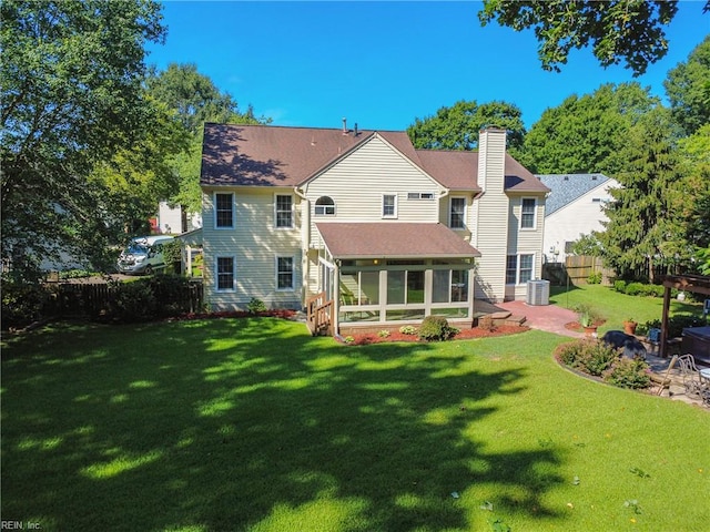 4300 Galston Ct, Chesapeake, VA 23321 - back of house featuring a sunroom, a patio, and a chimney