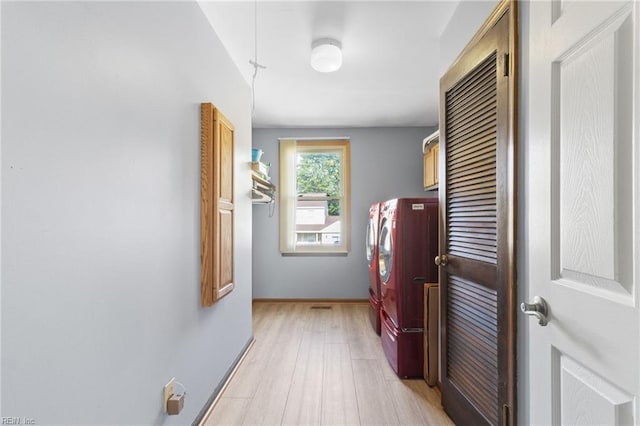 1760 Moonstone Dr, Virginia Beach, VA 23456 - corridor featuring separate washer and dryer and light wood-type flooring