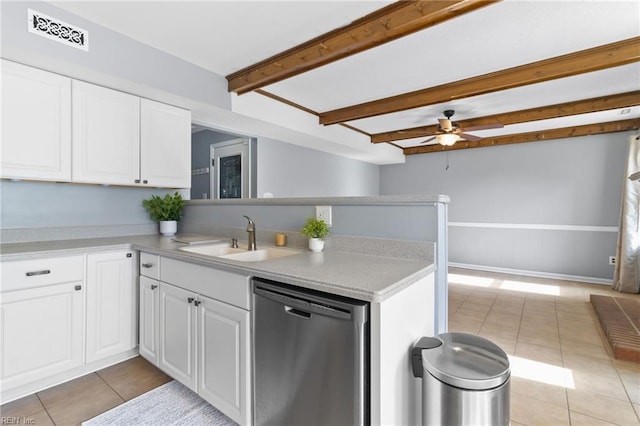 1760 Moonstone Dr, Virginia Beach, VA 23456 - kitchen featuring dishwasher, a peninsula, light tile patterned floors, a ceiling fan, and beamed ceiling